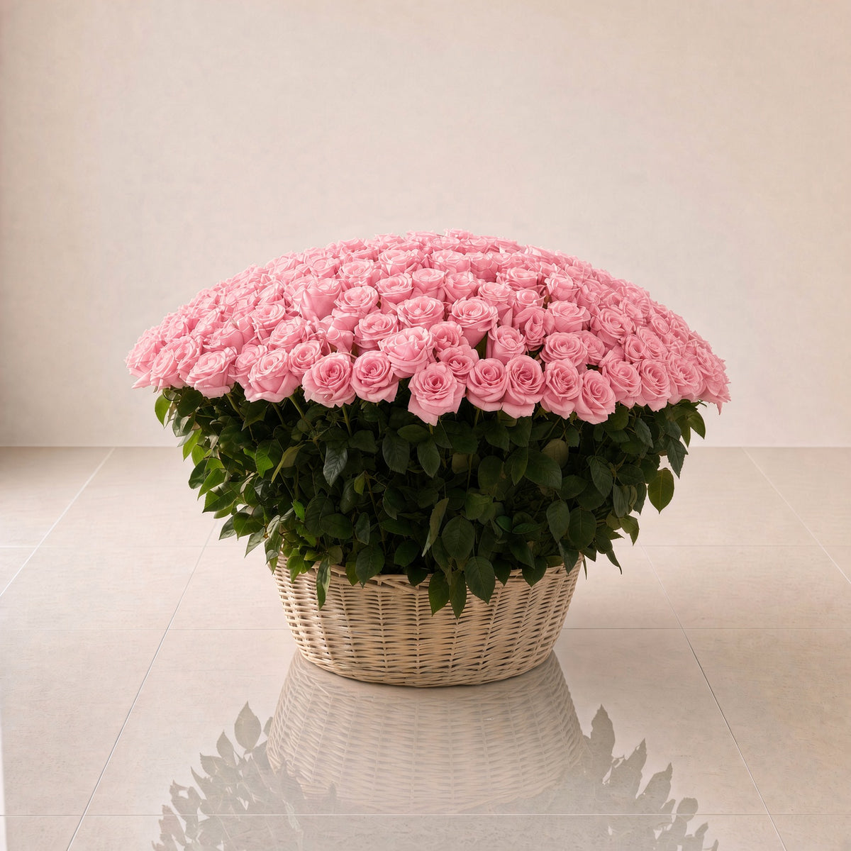 A large basket filled with 200 pink roses by Day & Night flowers in United Arab Emirates, Same-Day Delivery, Open 24hrs